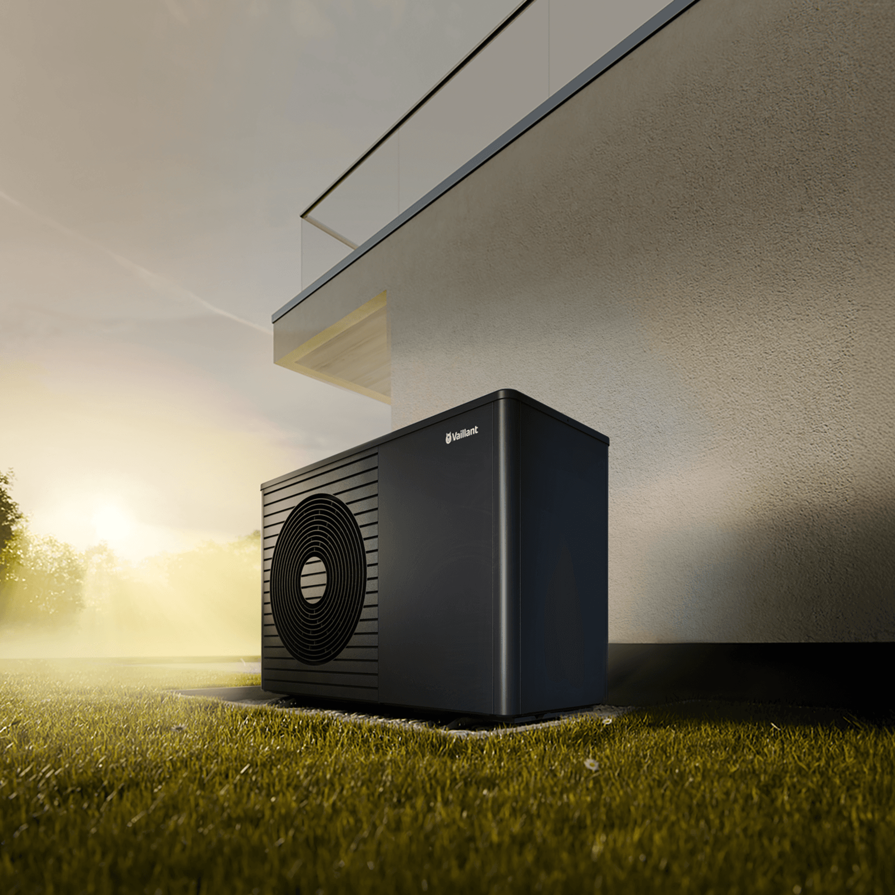 Wärmepumpe aroTHERM plus vor Hauswand mit Sonnenuntergang im Hintergrund